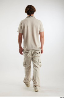 Lyle  1 back view beige cargo pants beige polo…